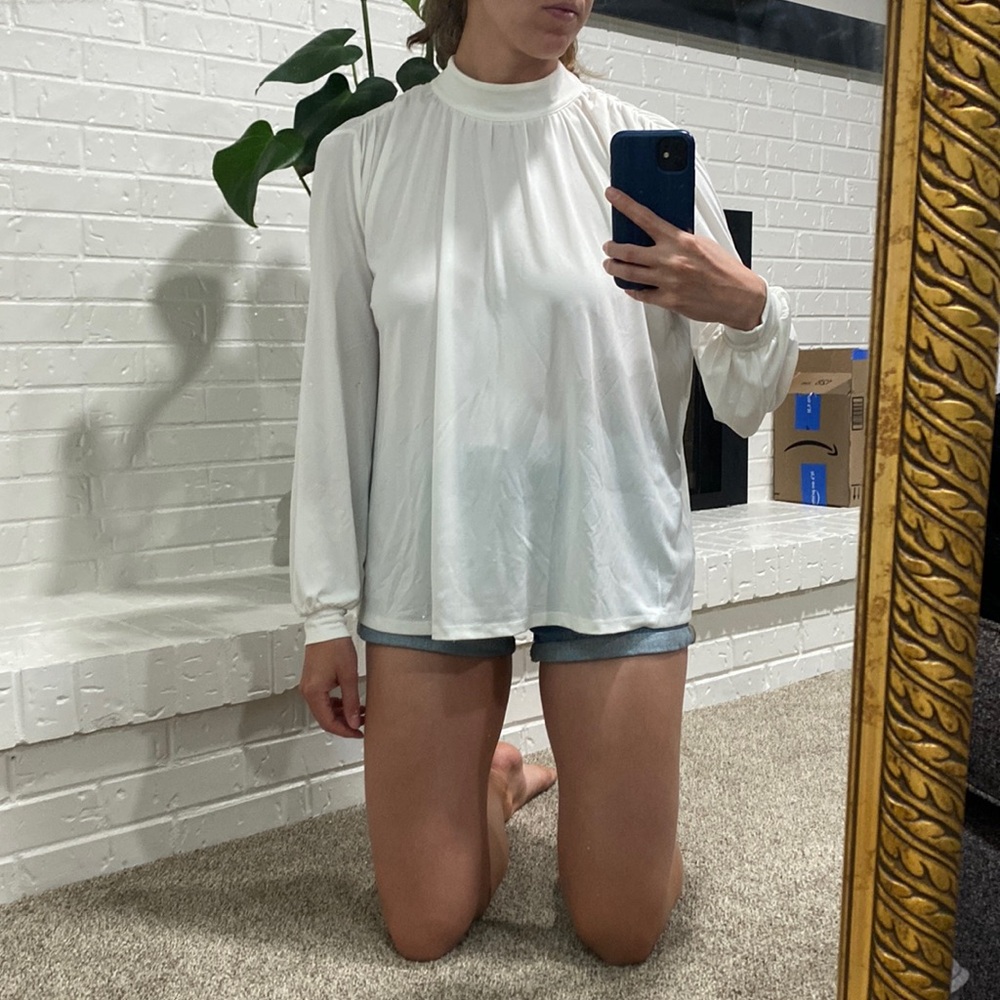 White long sleeve top